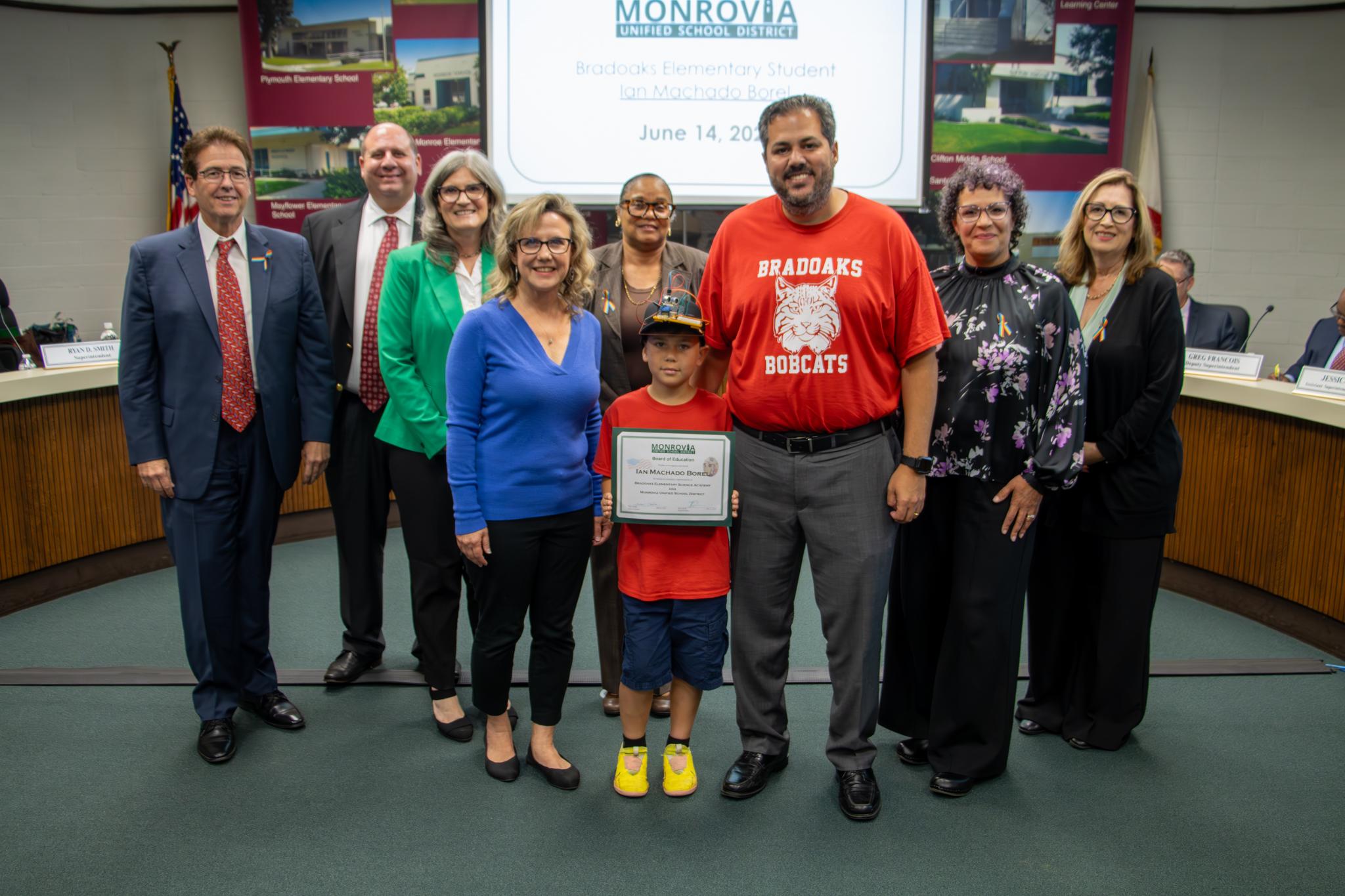Applauding Bradoaks student Ian Machado Borel for his amazing invention! At the June 14th board meeting, he presented his hat that alerts the visually impaired with a beep, providing crucial information about obstacles ahead.