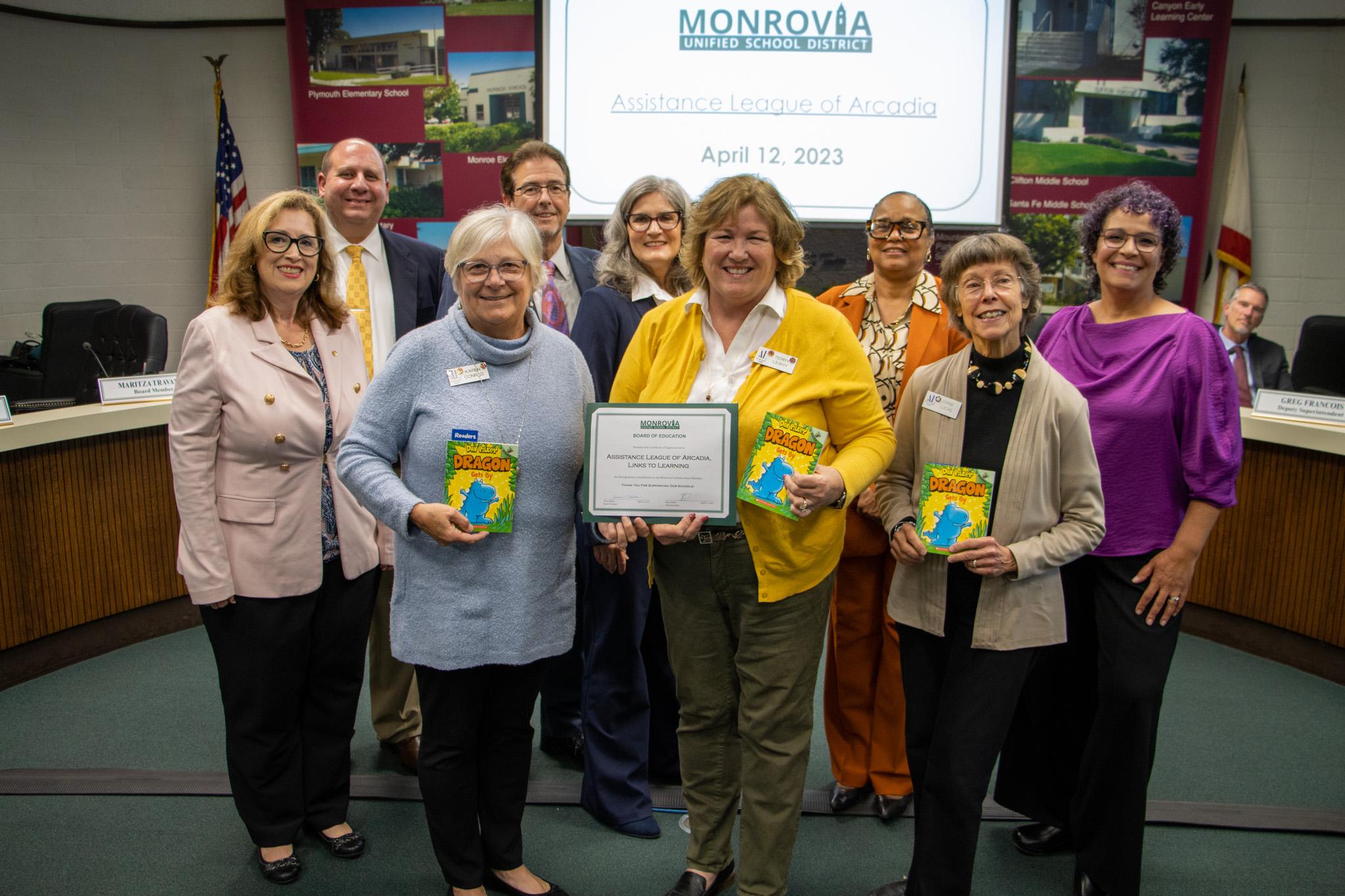 The Board recognized the Assistance League of Arcadia for donating $1,000 to each of our school libraries and giving each of our 2nd graders a copy of “Dragon Gets By.”